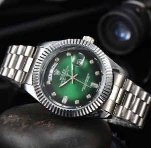 ROLEX DAY DATE (GREEN CRYSTAL)